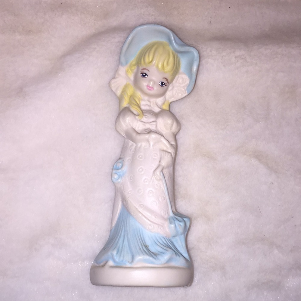 Vintage girl figurine. Almost 6” tall.